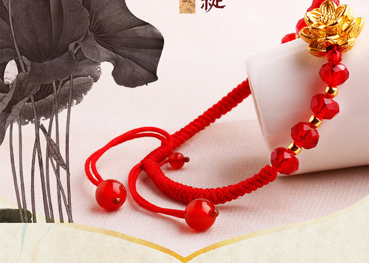 中国风足金红琉璃编织红绳转运珠黄金手链