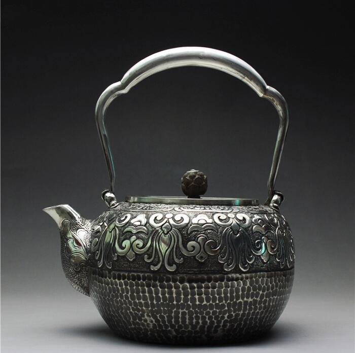 高工雕刻中国风传统图案银壶的好处